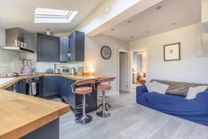 Kitchen opening to Dining area- click for photo gallery